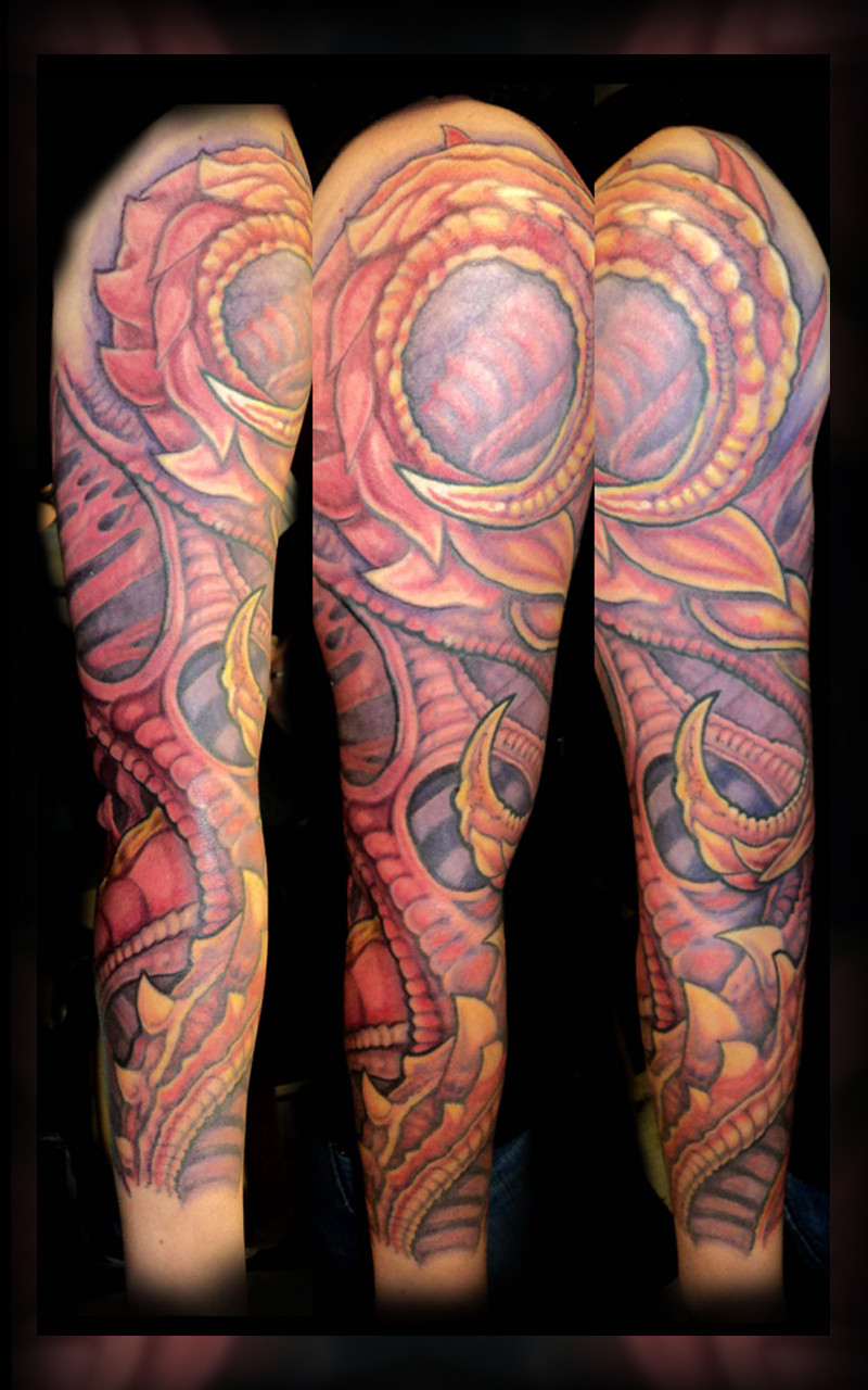 Pink biomechanical sleeve tattoo